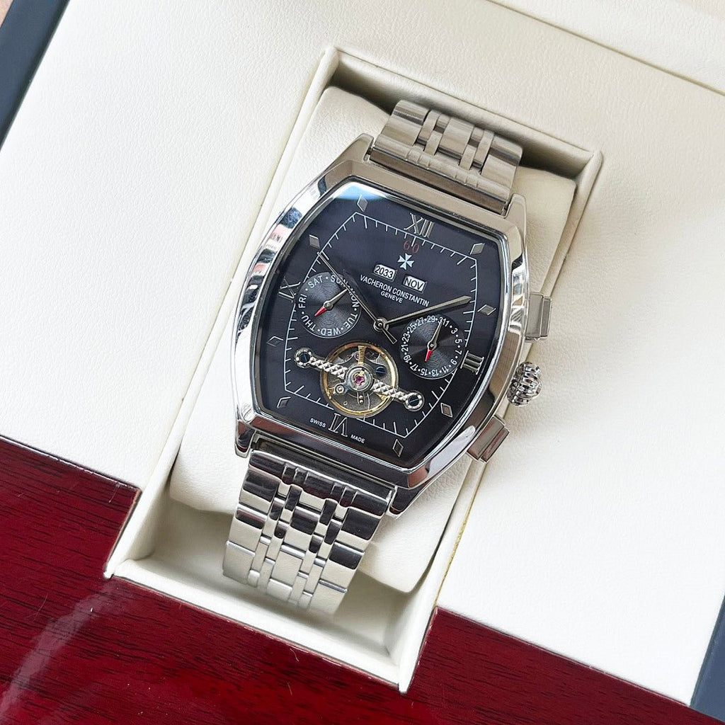 Vacheron Constantin two-tone wristwatch with black dial and silver bracelet, in box