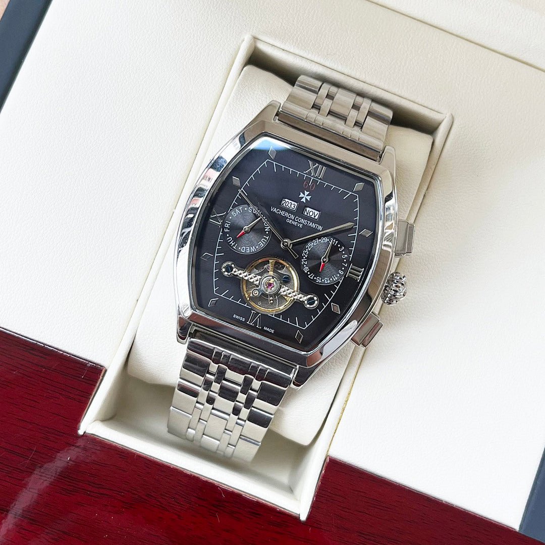 Vacheron Constantin two-tone wristwatch with black dial and silver bracelet, in box
