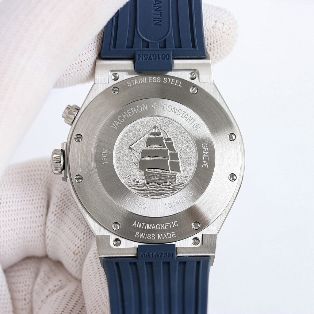 Stainless steel caseback with engraved antimagnetic and Swiss made text, blue strap