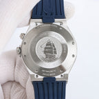 Stainless steel caseback with engraved antimagnetic and Swiss made text, blue strap