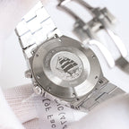 Vacheron Constantin watch caseback with engraved emblem and link bracelet