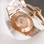 Vacheron Constantin rose gold watch back with engraved emblem and screw details.