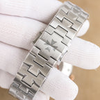 Vacheron Constantin watch bracelet closeup, silver metal links with geometric pattern