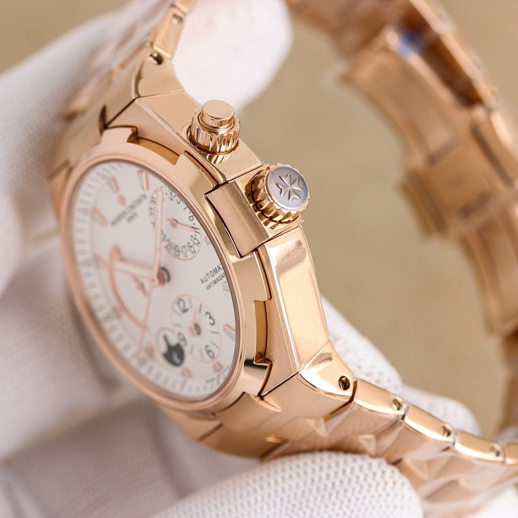 Vacheron Constantin watch with rose gold case, white dial, crown and strap close-up