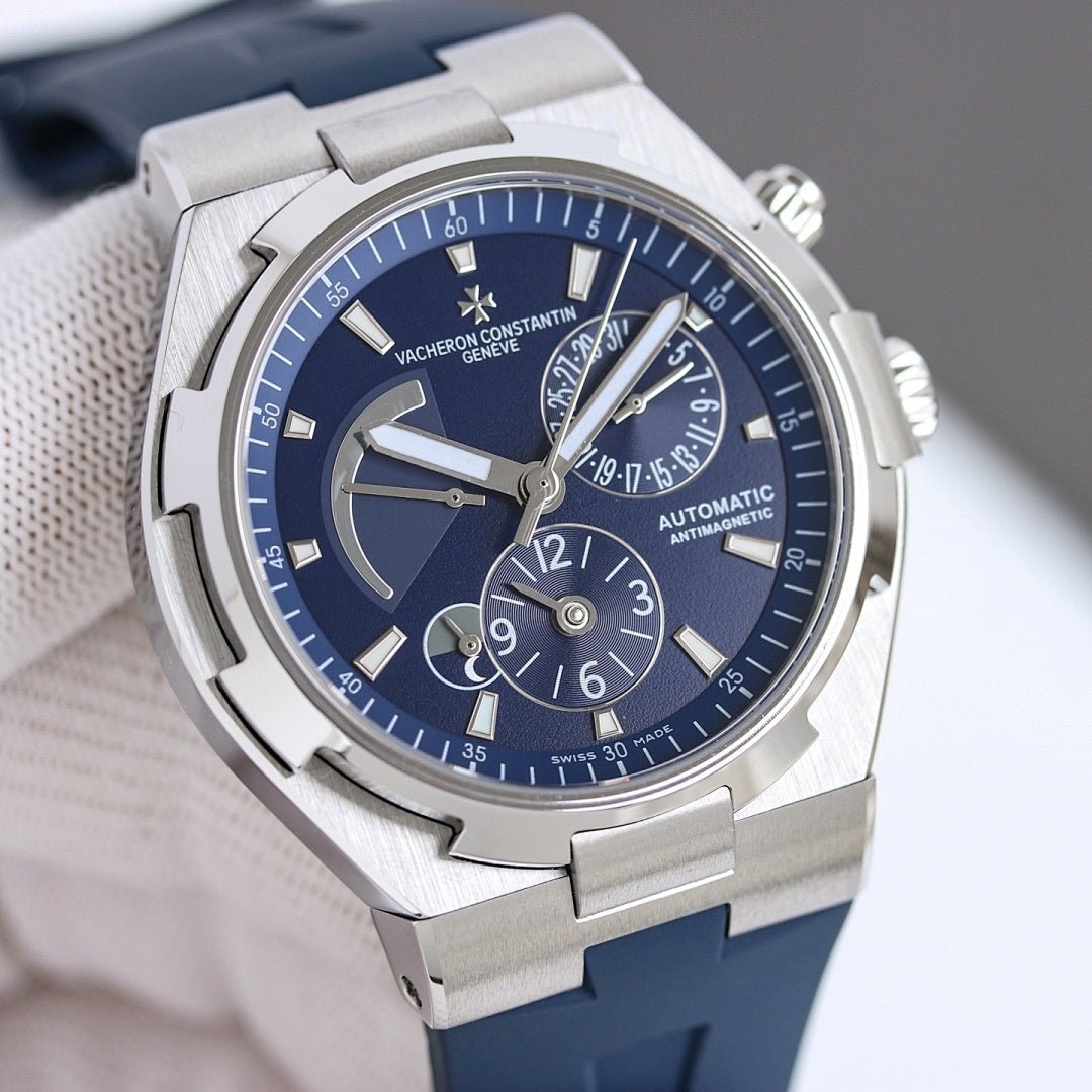 Automatic wristwatch with blue dial, steel case, and links of the metal bracelet