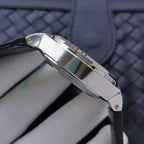 Stainless steel watch case side with crown and polished links