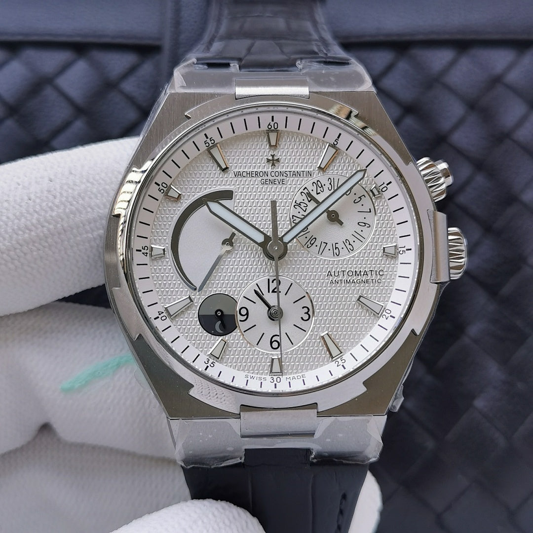 Wristwatch with silver dial, moonphase, chronograph subdials, navy strap