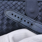 Navy leather watch strap with stitched edge and multiple buckle holes