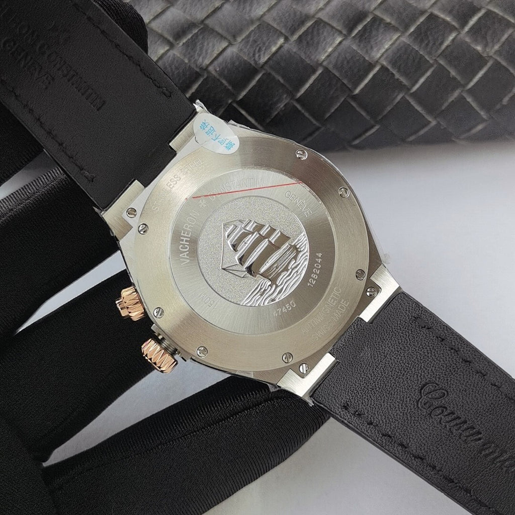 Vacheron Constantin watch caseback with engraved emblem and black leather strap