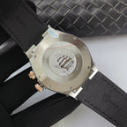 Vacheron Constantin watch caseback with engraved emblem and black leather strap