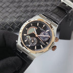 Vacheron Constantin watch with black dial and black leather strap, three-quarter view