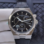 Vacheron Constantin automatic wristwatch with black dial and dark leather strap