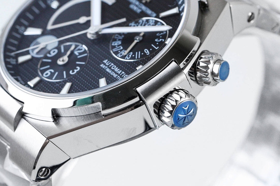 Vacheron Constantin watch with blue crowns and textured dial edge, close-up