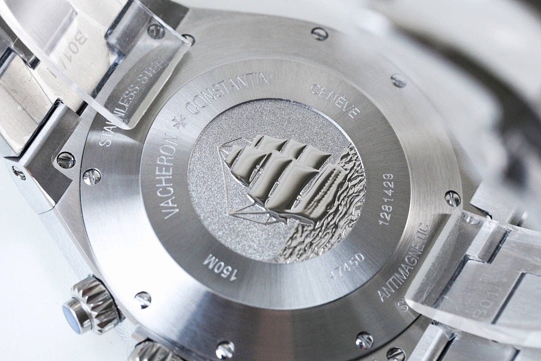Vacheron Constantin watch caseback with engraved medallion and serial markings