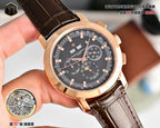 Rose gold wristwatch with dark dial, brown leather strap, and three subdials