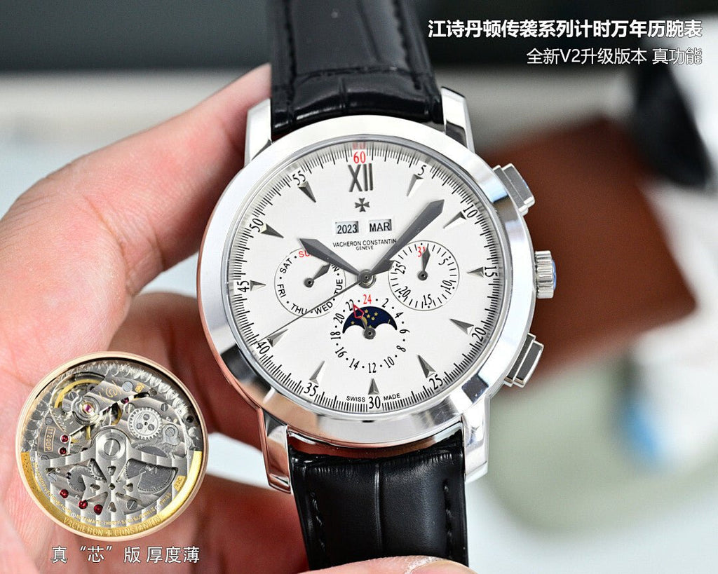 Round wristwatch with white dial, black leather strap, silver bezel and side crown.