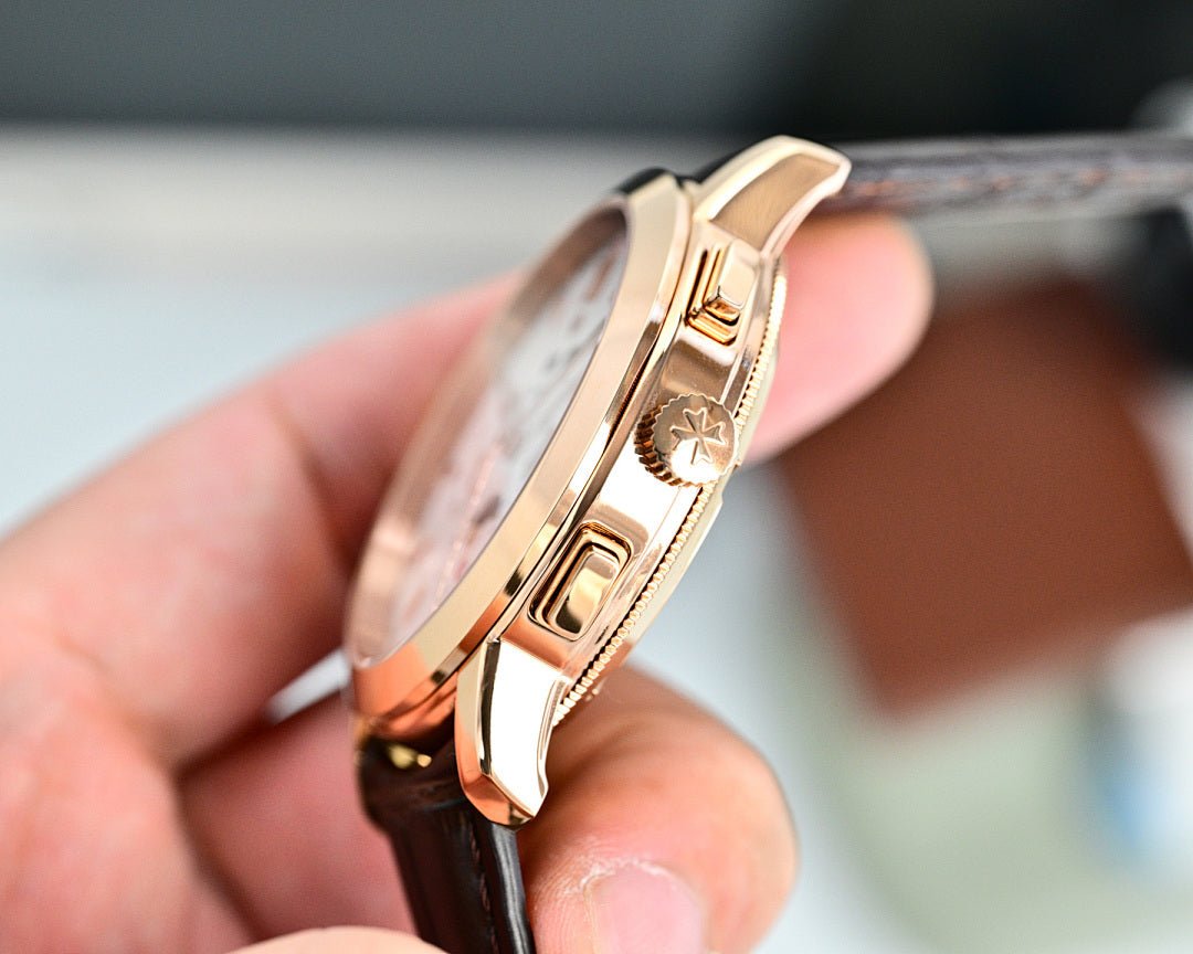 Vacheron Constantin wristwatch side profile with gold-tone case and crown, brown leather strap