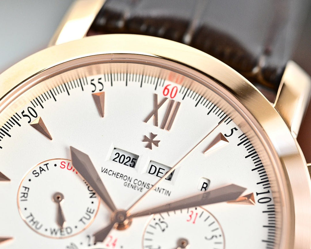 Vacheron Constantin wristwatch close-up of white dial with gold hands and date window