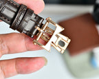 Vacheron Constantin wristwatch buckle with brown leather strap and gold-tone clasp