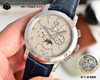 Men's wristwatch with light dial, blue leather strap, silver case, and moonphase subdial