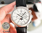 Men's wristwatch with white dial, black leather strap, silver bezel, and date at 3 o'clock