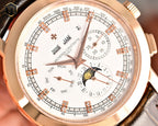 Close-up of rose-gold wristwatch dial with Roman markers, subdials and date window
