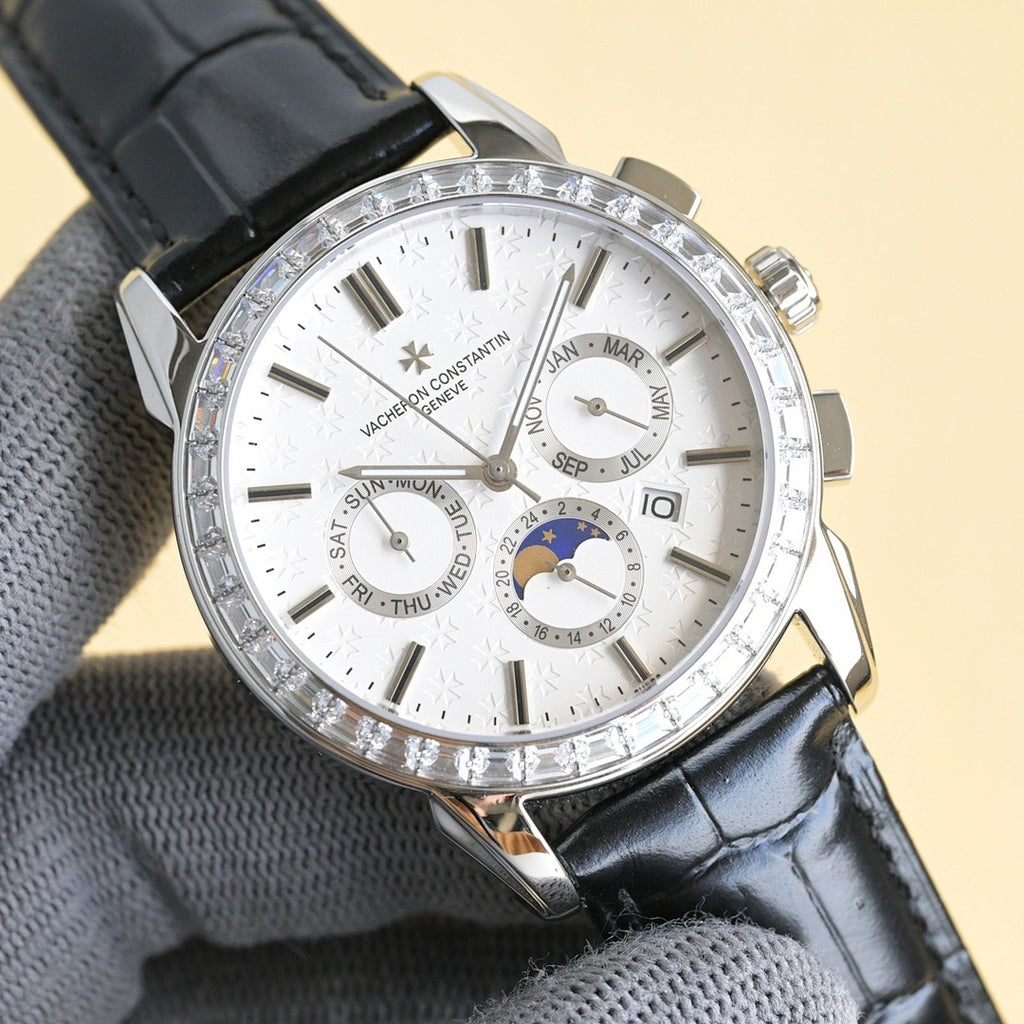Luxury wristwatch with white dial, black leather strap, and small subdials