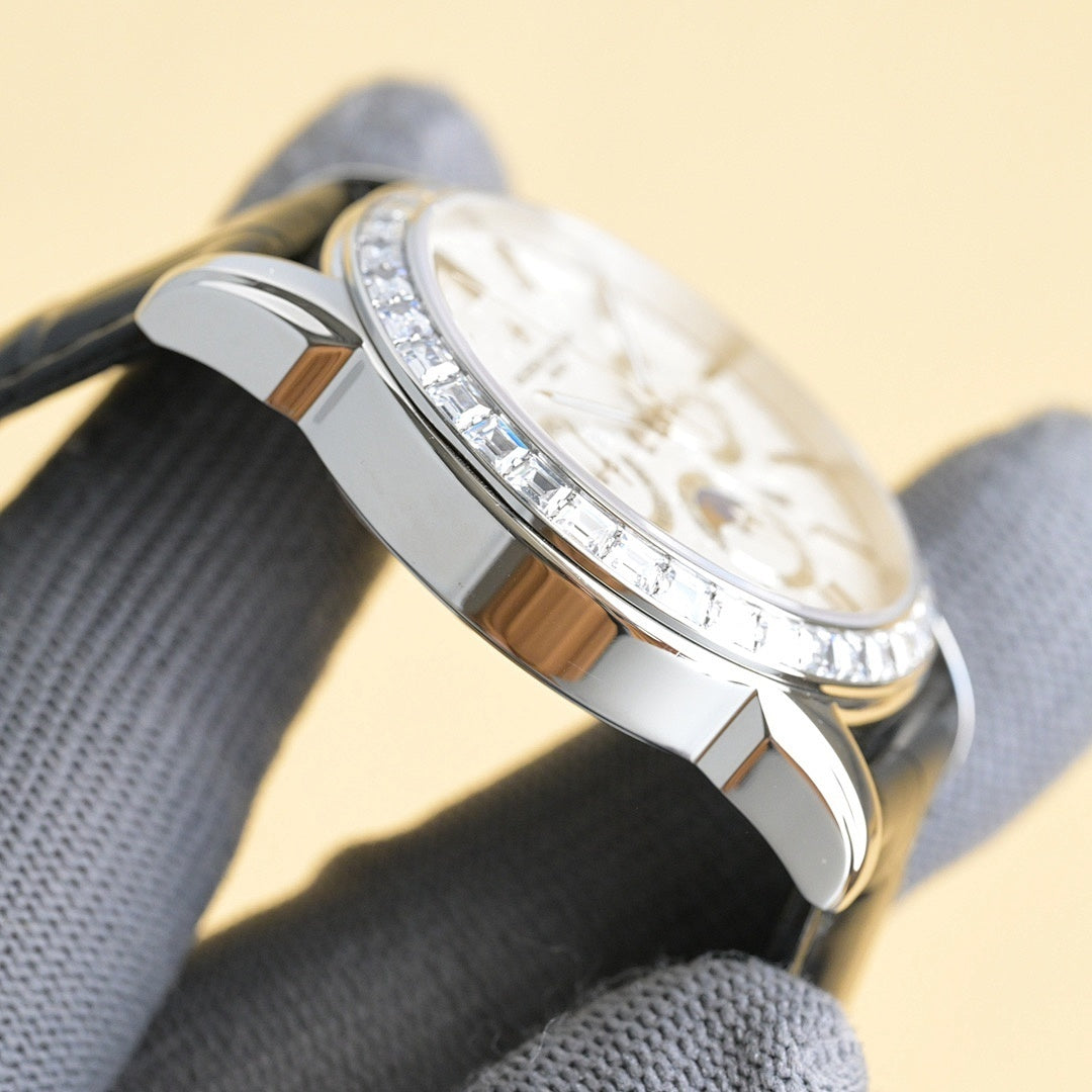 Luxury wristwatch side view with black leather strap and polished metal case
