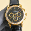 Vacheron Constantin wristwatch with black dial, gold case, diamond bezel, leather strap