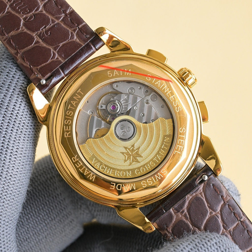 Vacheron Constantin wristwatch with gold back case and engraved dial, leather strap