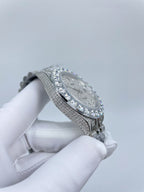 Diamond bezel wristwatch with engraved bezel edge and silver bracelet links