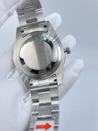 Rolex watch back case view with stainless bracelet and crown side detail