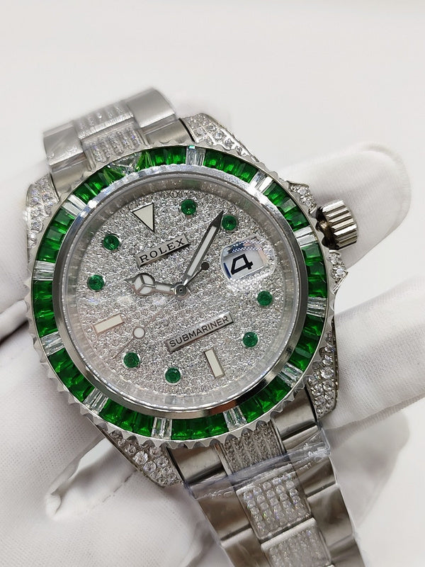Rolex Submariner watch with green bezel and dial, diamond-set bezel detail, side crown