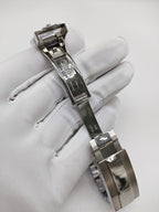 Stainless steel wristwatch case and bracelet with side profile and clasp