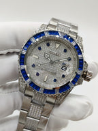 Rolex Submariner-style wristwatch with blue bezel and silver dial face