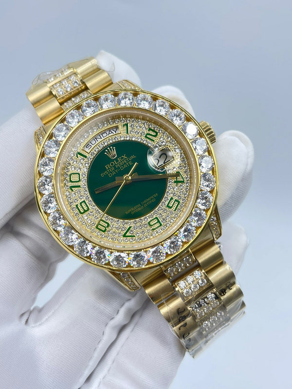 Rolex wristwatch angled view, green dial with day-date markers and gold case