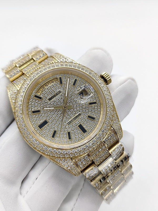Gold-tone diamond watch face and bracelet with crown on side