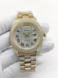 Gold-tone diamond watch with champagne dial, Roman numerals, Day-Date window, bracelet