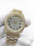 Gold-tone diamond watch with champagne dial, Roman numerals, Day-Date window