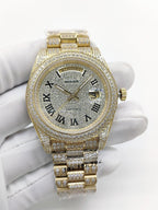 Gold-tone diamond watch with champagne dial and Roman numerals, Day-Date window
