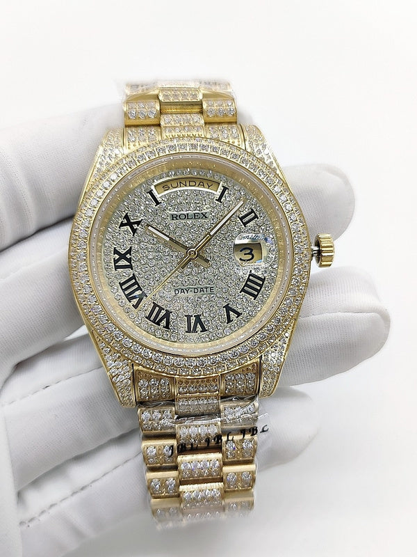 Gold-tone diamond watch with champagne dial and Roman numerals, Day-Date window