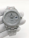 Diamond-set silver analog watch with textured dial and jeweled bracelet