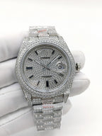 Rolex diamond-accent watch with silver dial, Roman numerals, and jeweled bezel