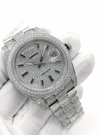 Rolex diamond-accent watch angled view with silver dial and Roman numeral markers