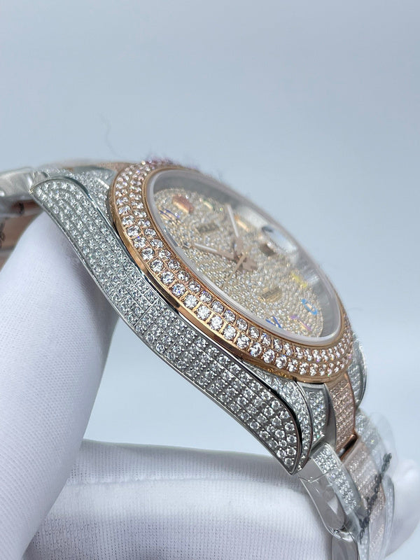Rolex watch angled close-up of diamond bezel and multicolor dial under clear glass