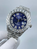 Rolex Datejust watch front view with blue dial, diamond bezel, and Roman numerals