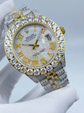 Rolex Datejust two-tone diamond watch with white dial, gold markers, and jeweled bracelet
