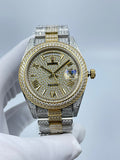 Diamond-encrusted watch with two-tone gold and silver bracelet, round champagne dial