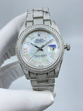 Rolex Datejust watch with diamond bezel, white mother-of-pearl dial, diamond bracelet