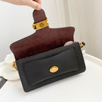 Coah bag burgundy suede-style crossbody with gold button closure and strap